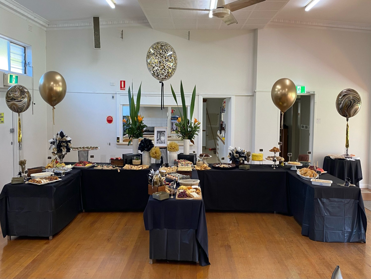 tables set up and decorated for event in function room
