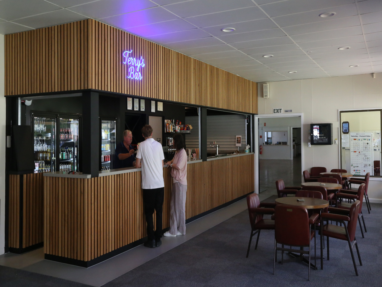 people being served at the newly renovated bar